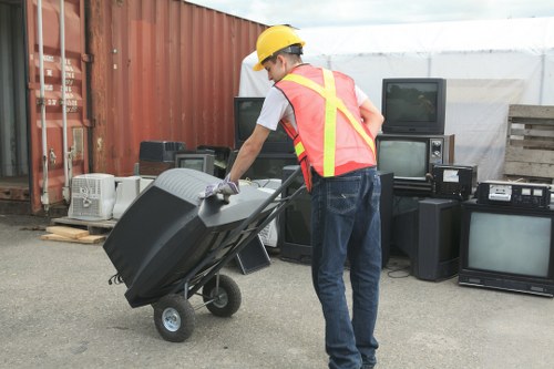 Operatives wearing PPE during a commercial waste clearance
